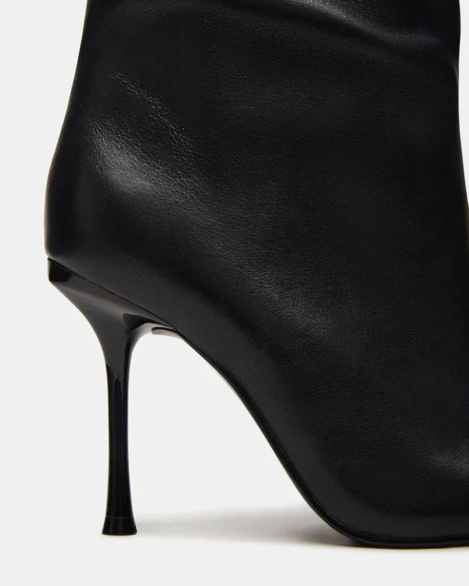 Förföriskt svart läder Förföriskt svart läder