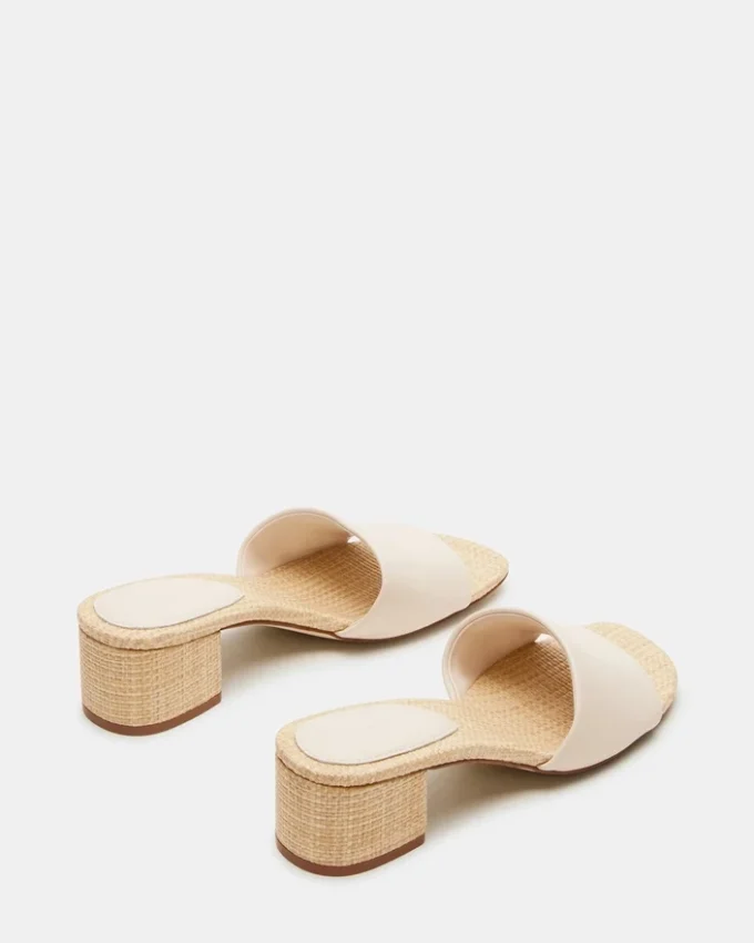 Hailee benvitt läder