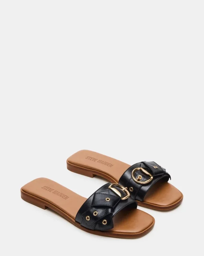 Hilaria i svart läder Hilaria i svart läder