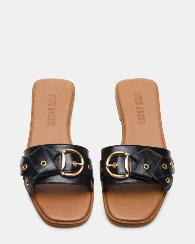 Hilaria i svart läder Hilaria i svart läder