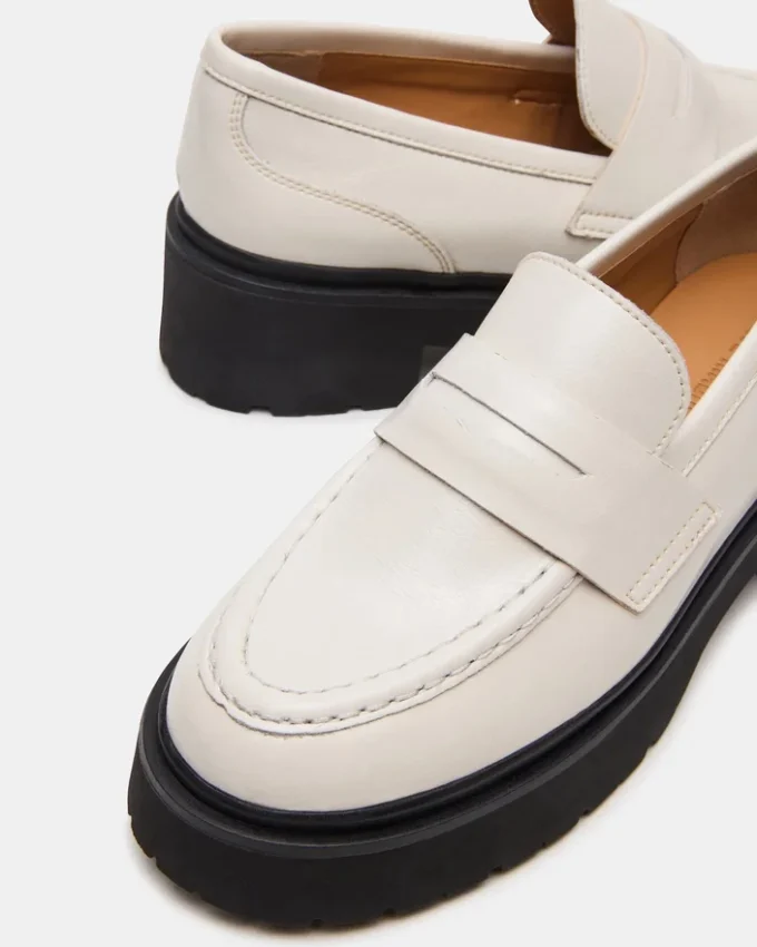 Layken benvitt läder