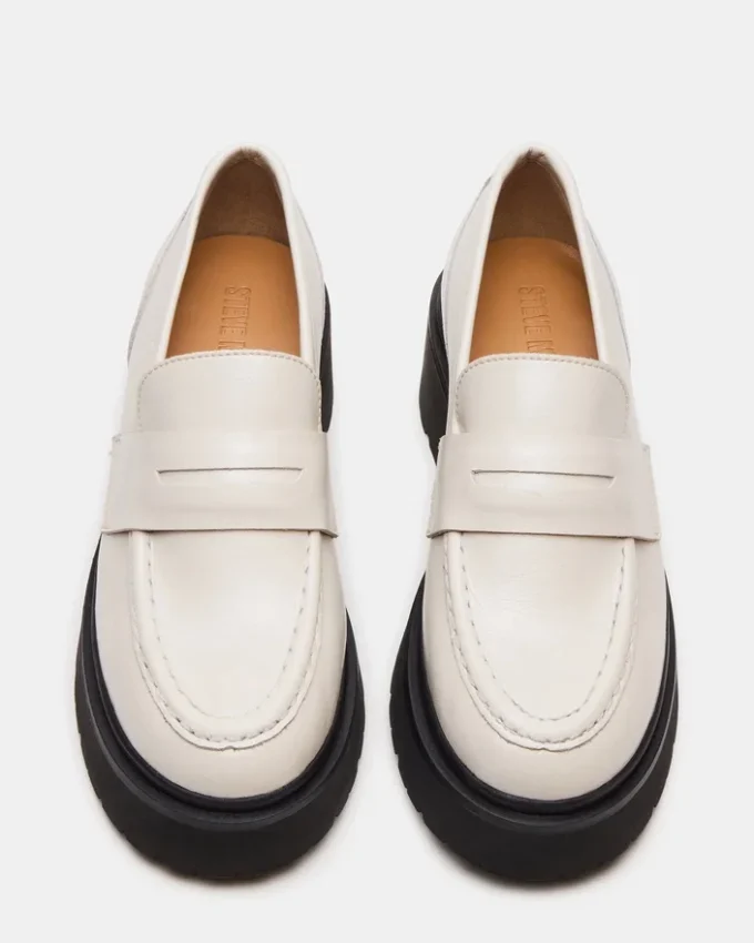 Layken benvitt läder