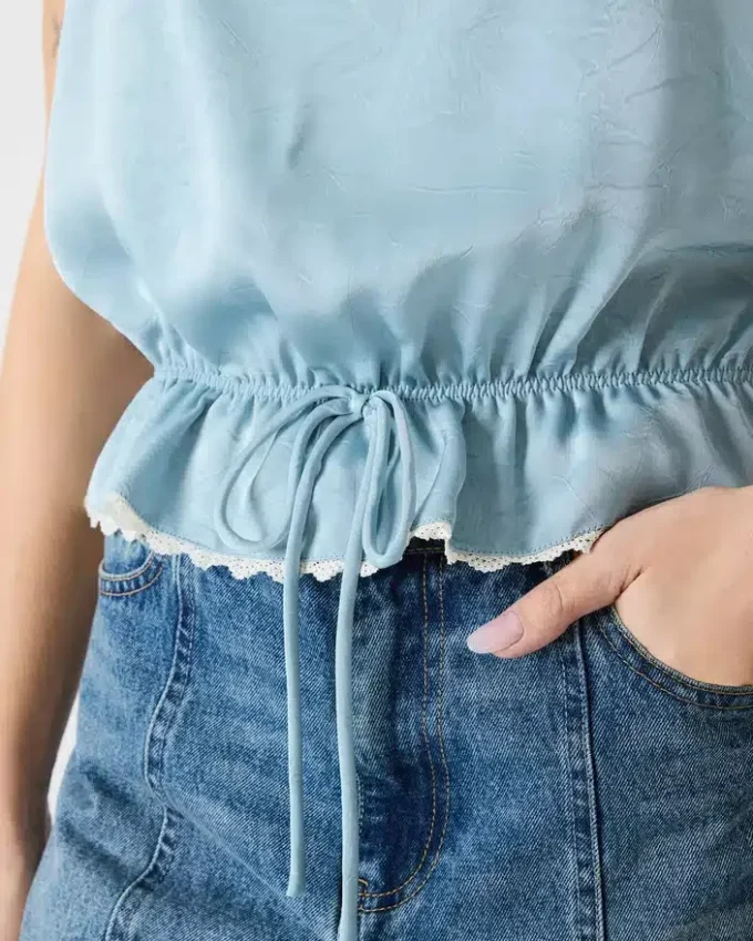 Roan-top i dammigt blått